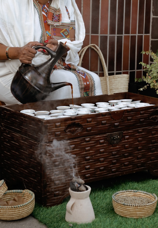 Traditional Ethiopian coffee ceremony with roasting and incense