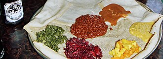 Injera platter with Ethiopian vegetarian stews