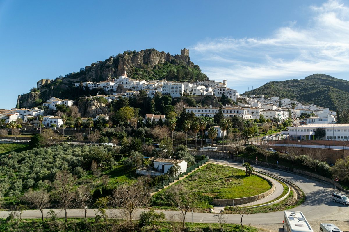Zahara de la Sierra, a whitewashed hilltop village surrounded by the Andalusian countryside in southern Spain