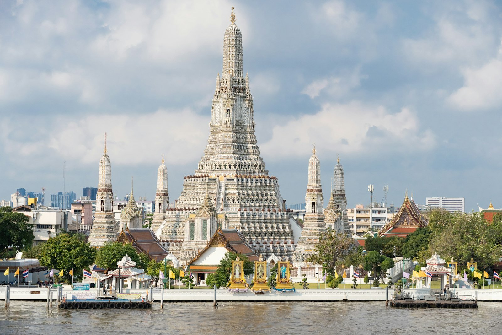 People walking near Wat Arun temple in Bangkok, Thailand