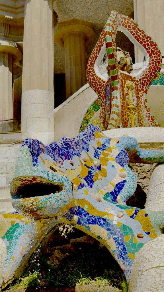 El Drac mosaic salamander fountain at Park Güell, Barcelona, with water dripping from its mouth