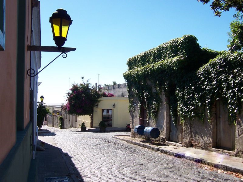 Typical cobblestone street lined with colonial houses in Colonia del Sacramento, Uruguay