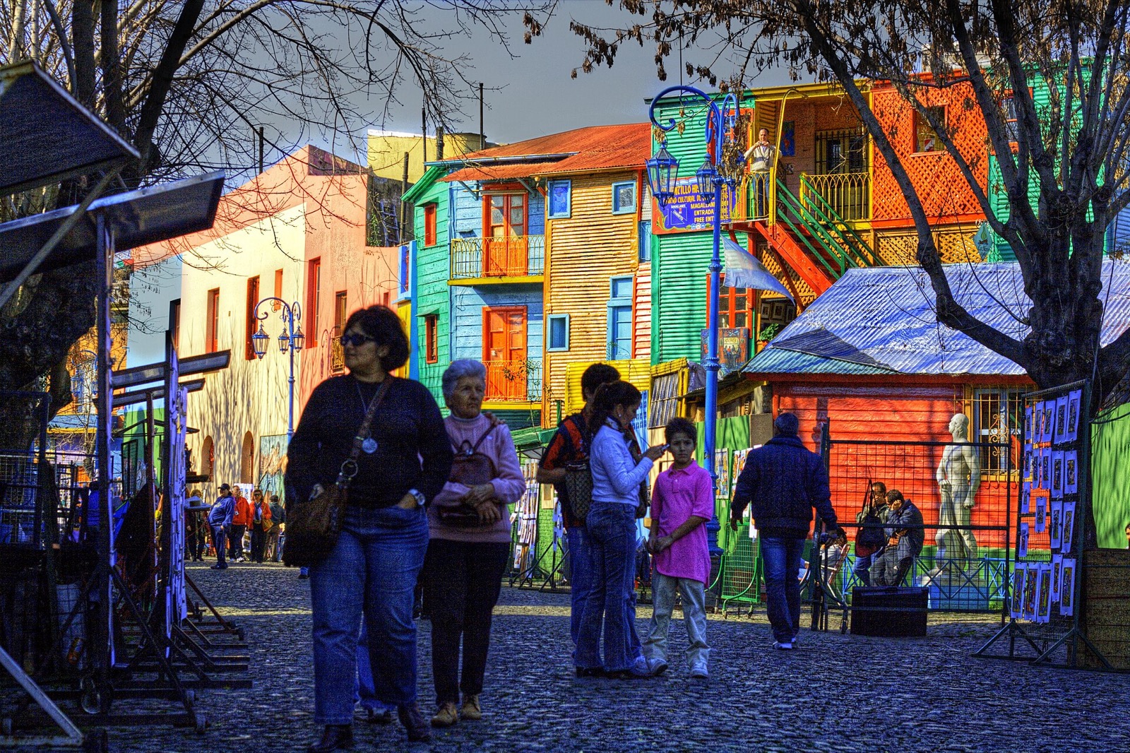 Colorful Caminito street in La Boca, Buenos Aires, with brightly painted houses and outdoor seating