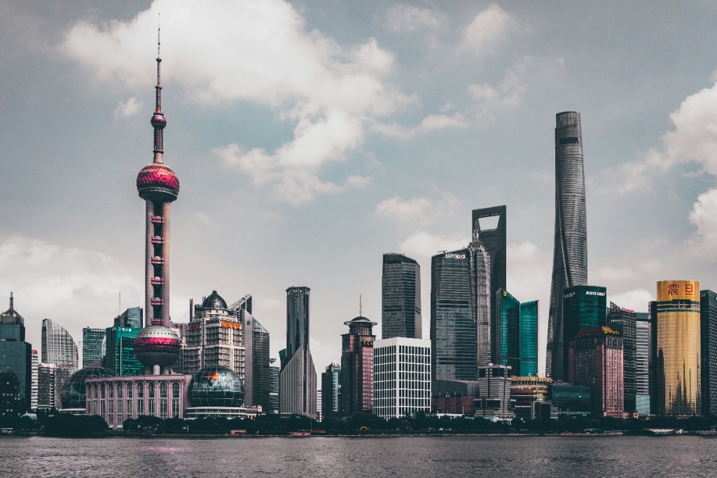 Pudong skyline across the Huangpu River with the Oriental Pearl Tower and Shanghai Tower