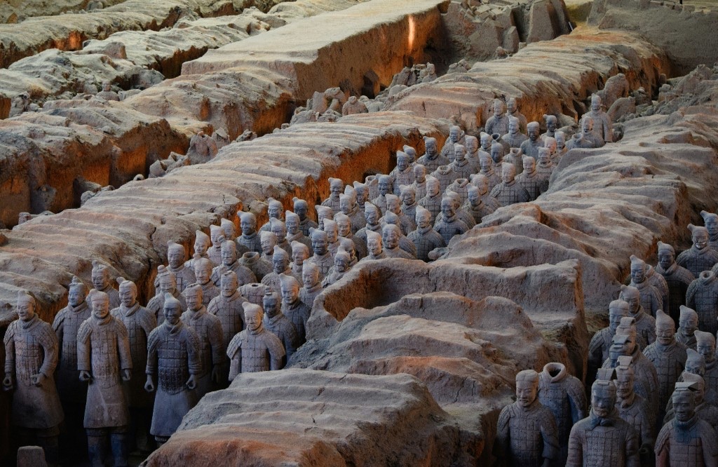 Rows of terracotta soldiers in excavated trenches at the Terracotta Army site near Xi’an