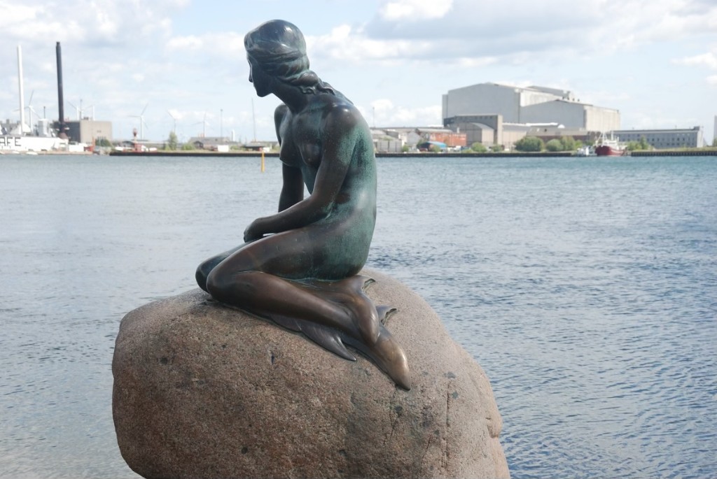 The Little Mermaid bronze statue on its rock in Copenhagen harbour