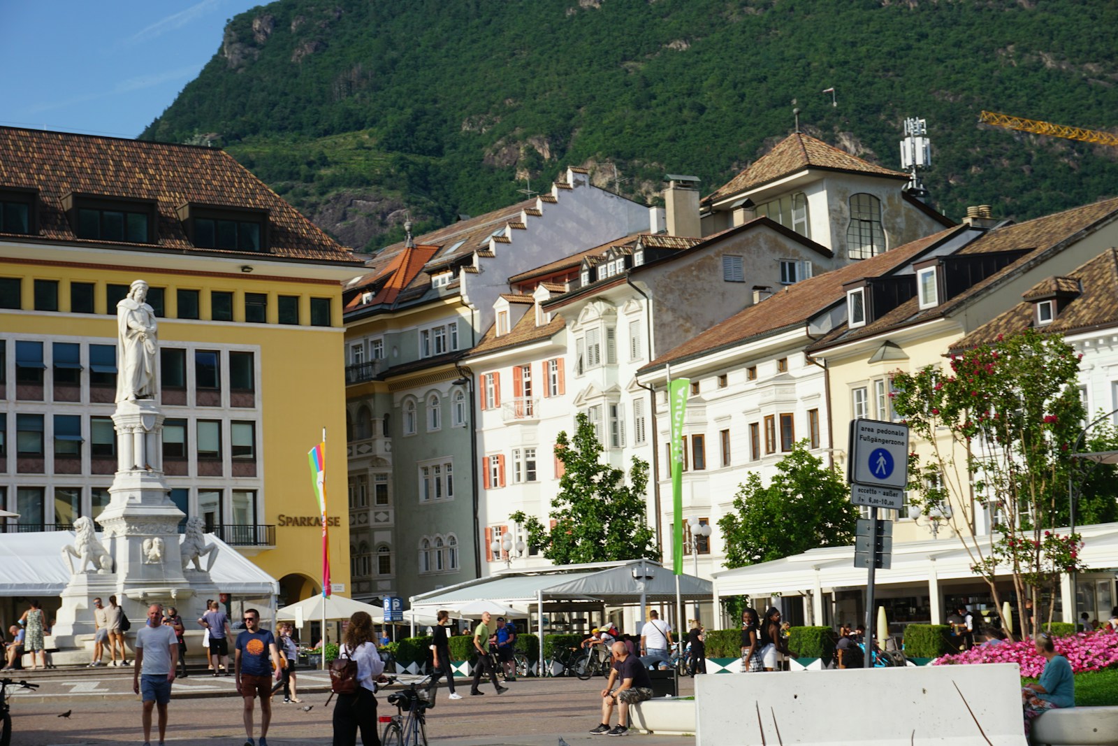 Bolzano, with historic buildings set against the green mountains of the South Tyrolean Alps