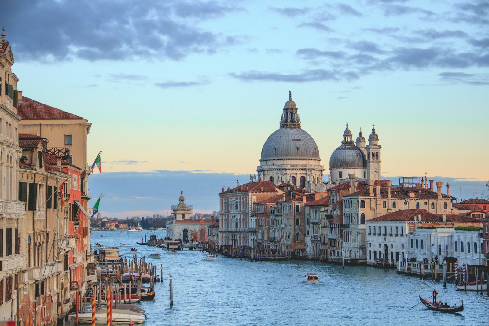 Venice with the Grand Canal, historic Venetian buildings, gondolas and the domes of Basilica di Santa Maria della Salute