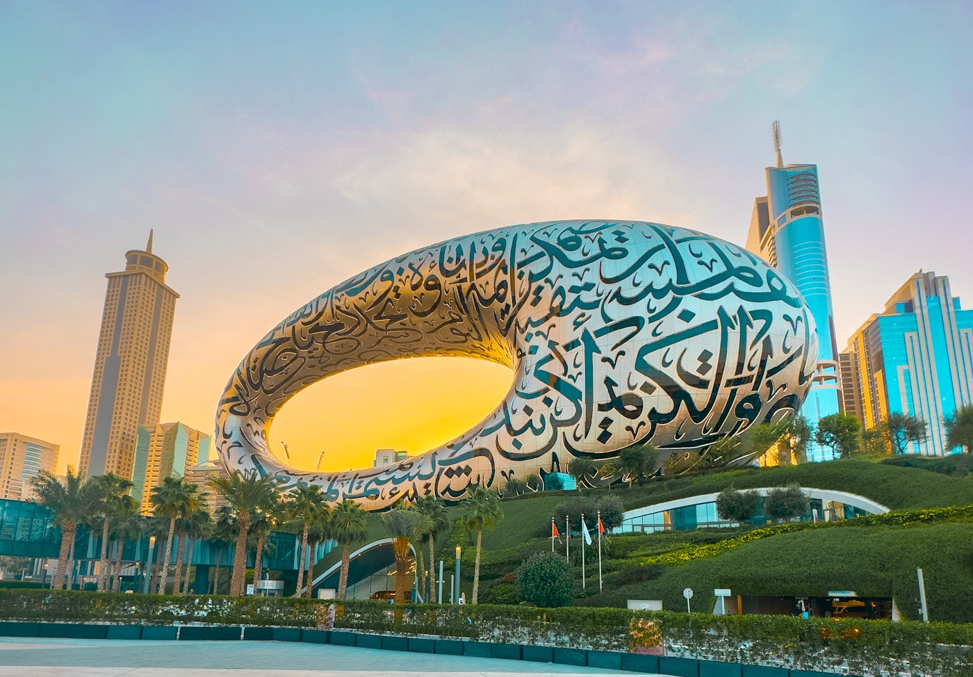Sculpture outside the Museum of the Future with Dubai cityscape behind