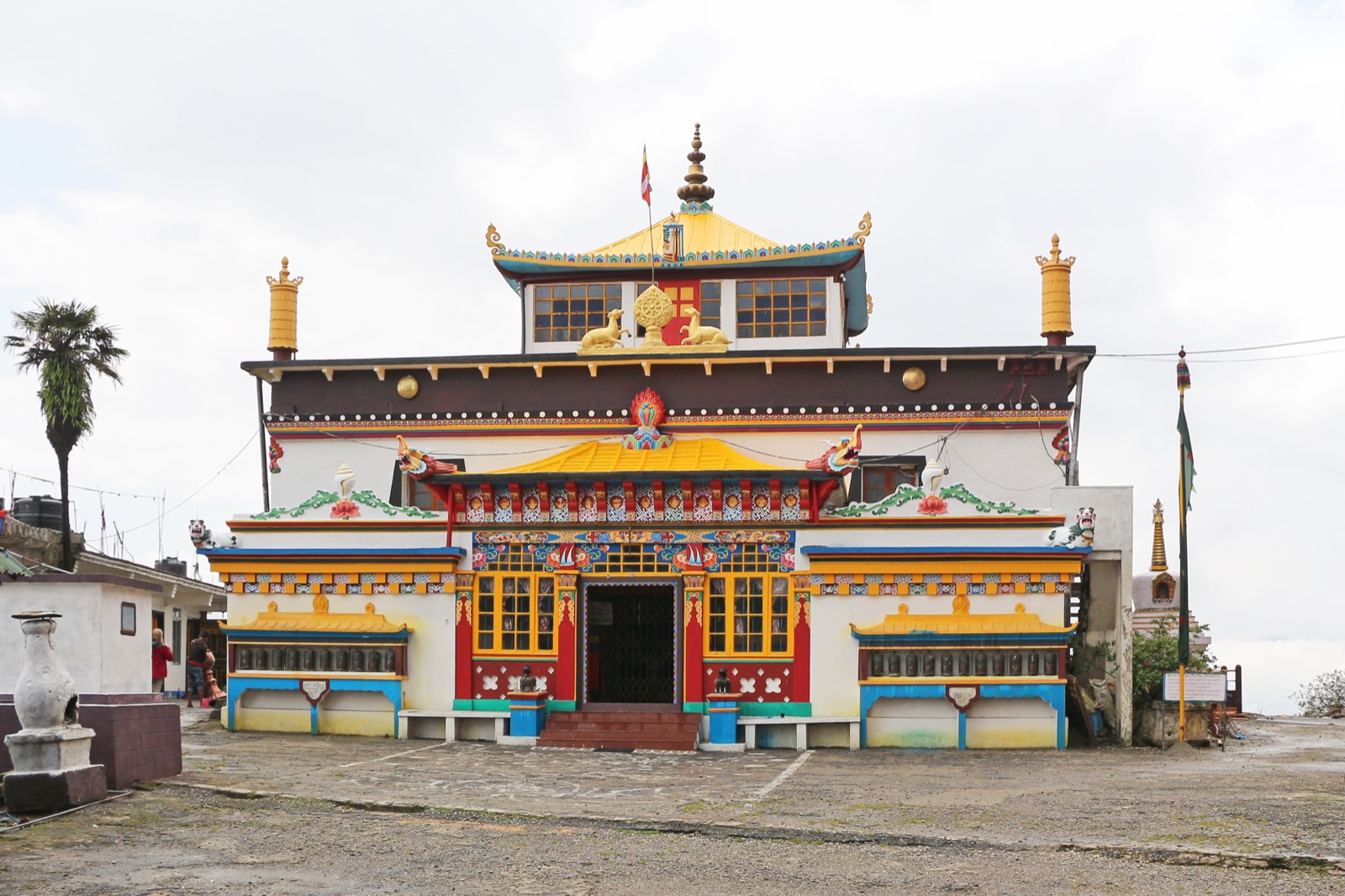 Buddhist monastery courtyard in Darjeeling with prayer flags
