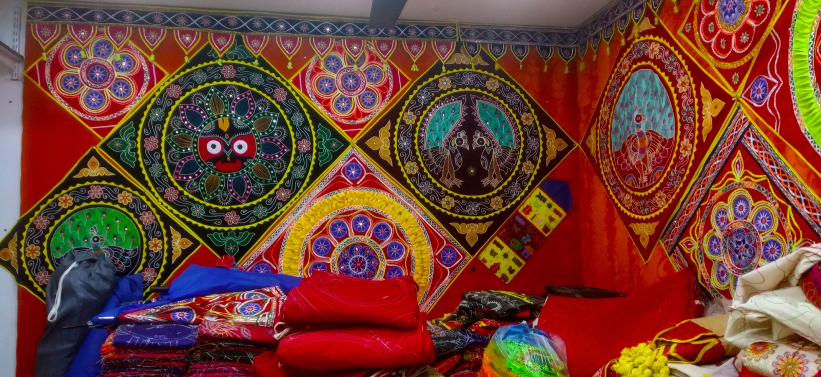 Colourful Pipili appliqué craft canopy and textiles in Odisha