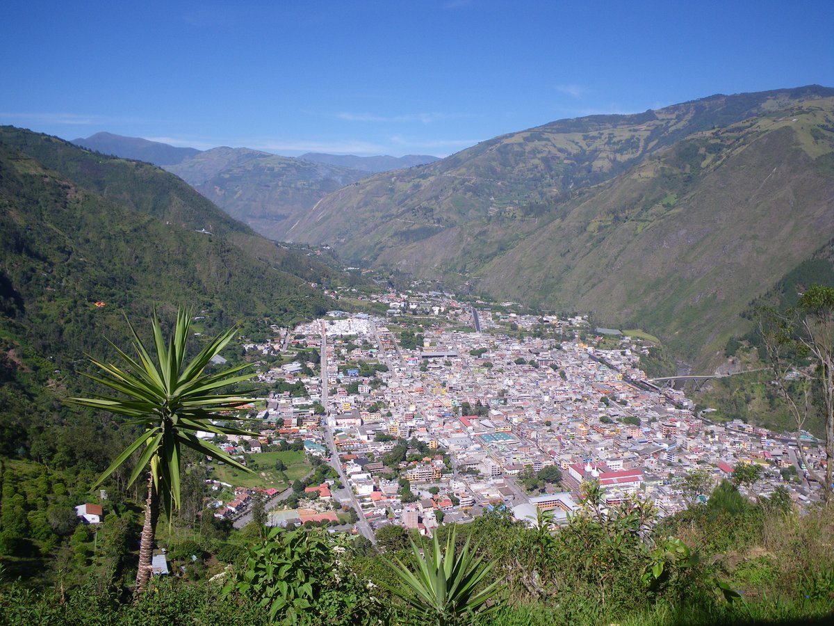 Baños de Agua Santa surrounded by green Andean mountains in Ecuador