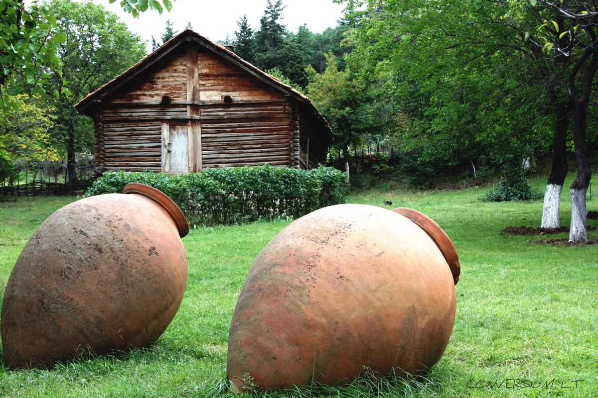 Traditional kvevri wine vessels in a Georgian cellar