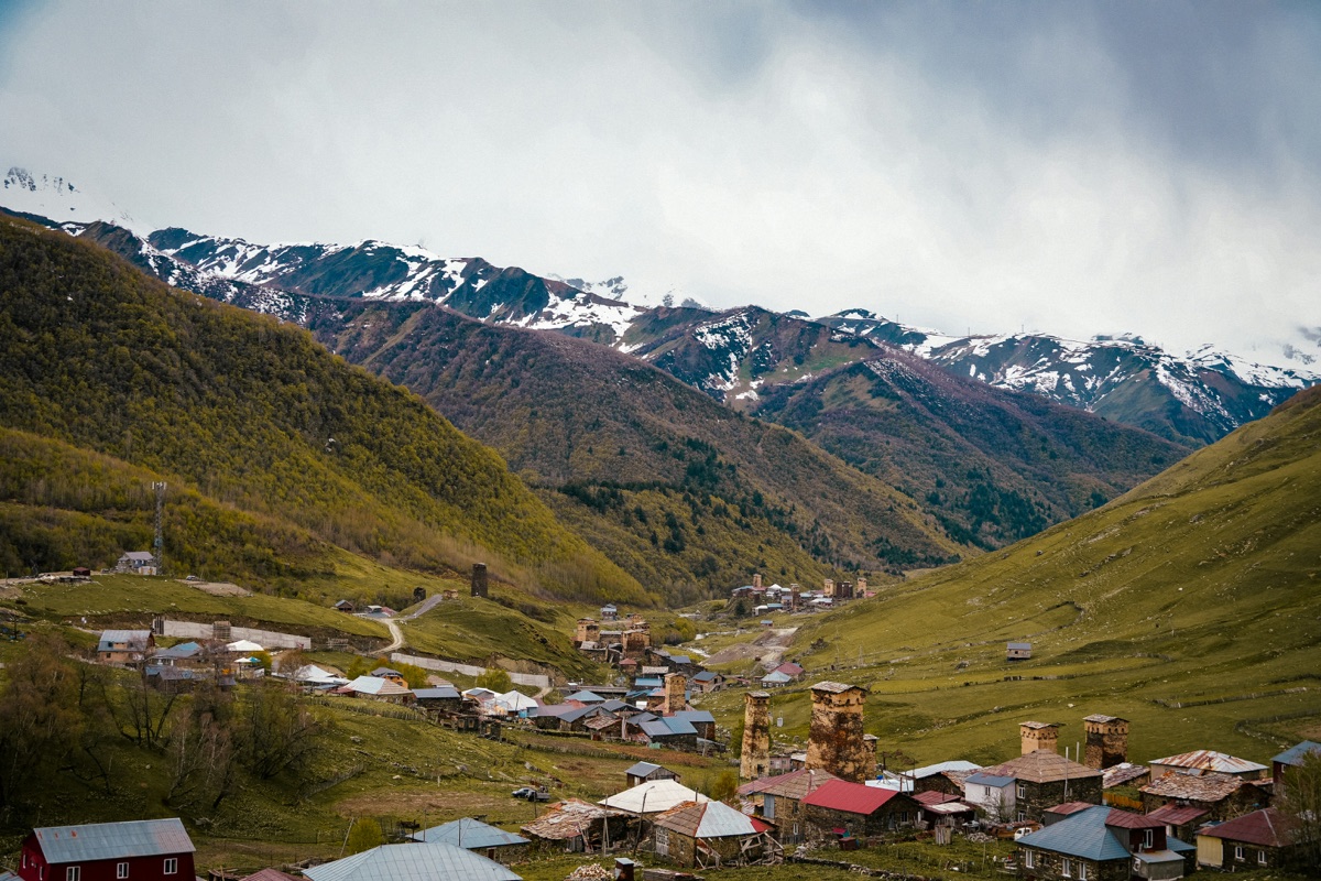 Ushguli village with medieval towers beneath snowy peaks