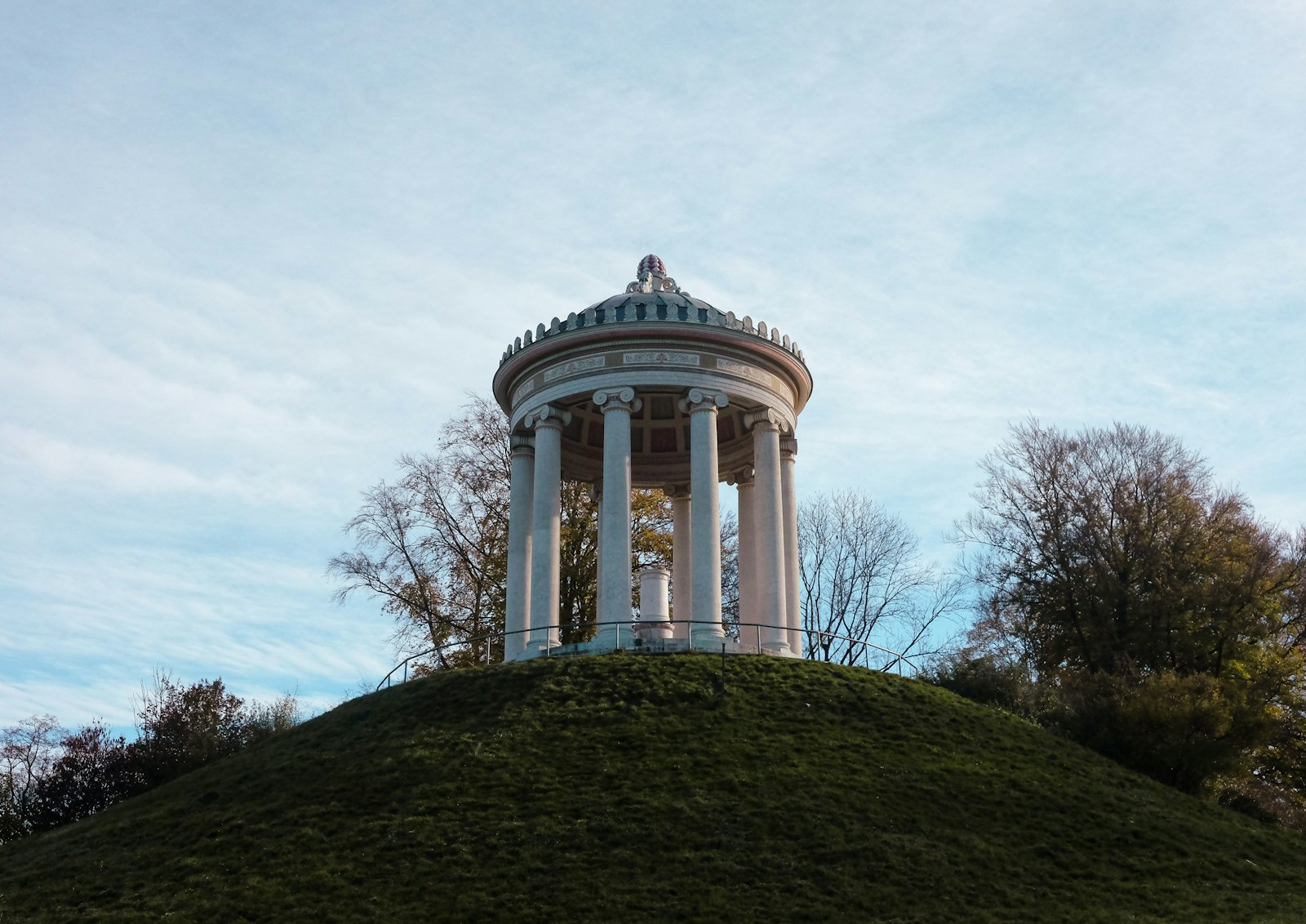 Monopteros temple on a hill in Munich’s English Garden