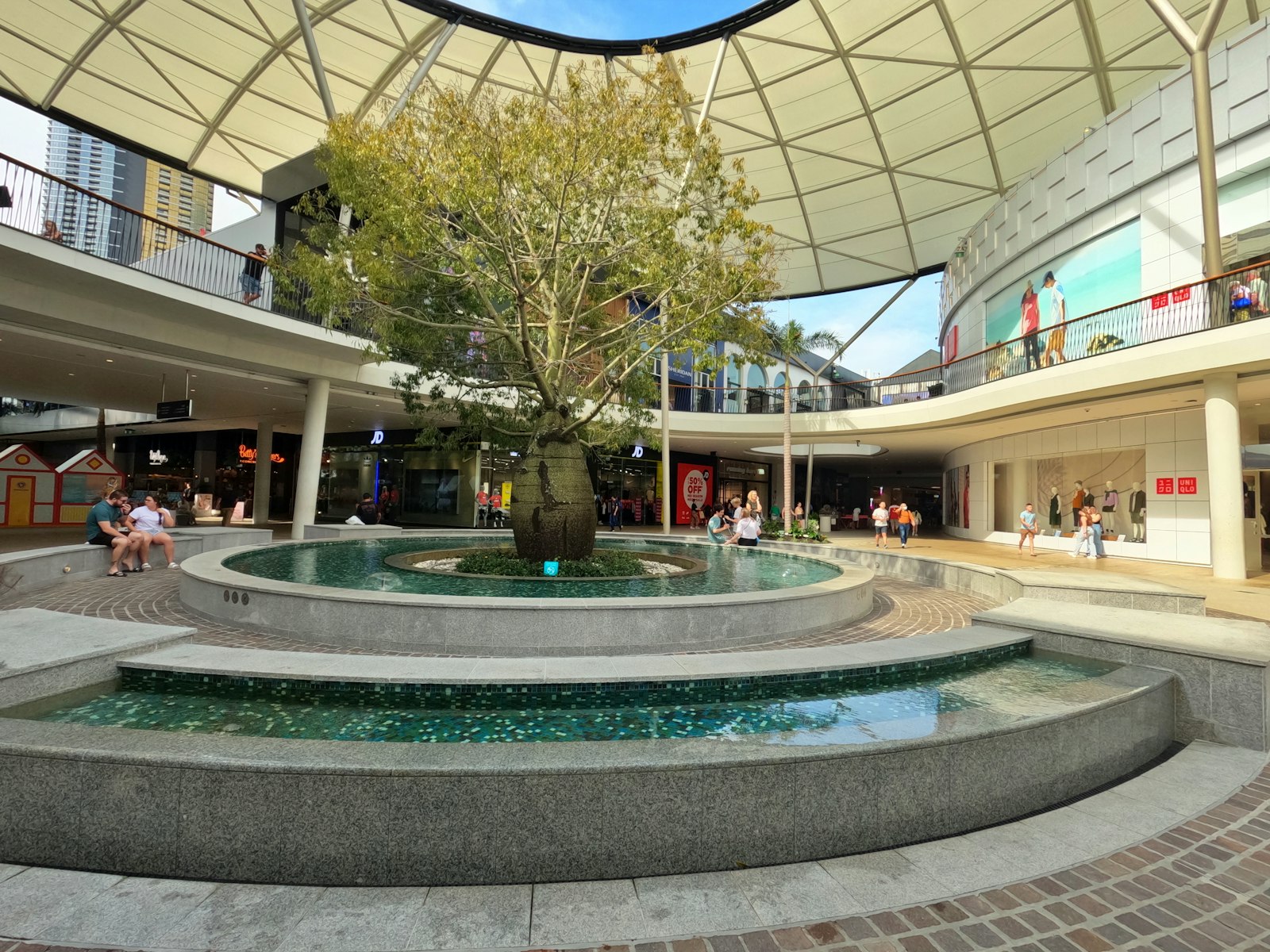Pacific Fair Shopping Centre in Broadbeach with central tree and fountain
