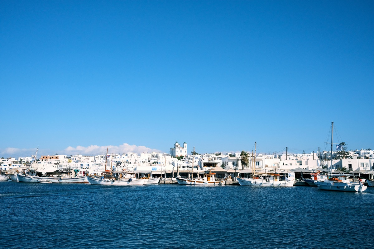 Fishing boats and waterfront restaurants in Naousa harbor, Paros