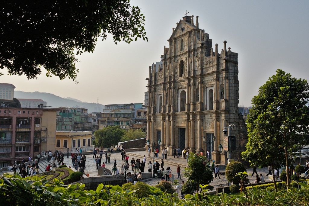 Ruins of St. Paul’s in Macao with visitors walking around the surviving facade