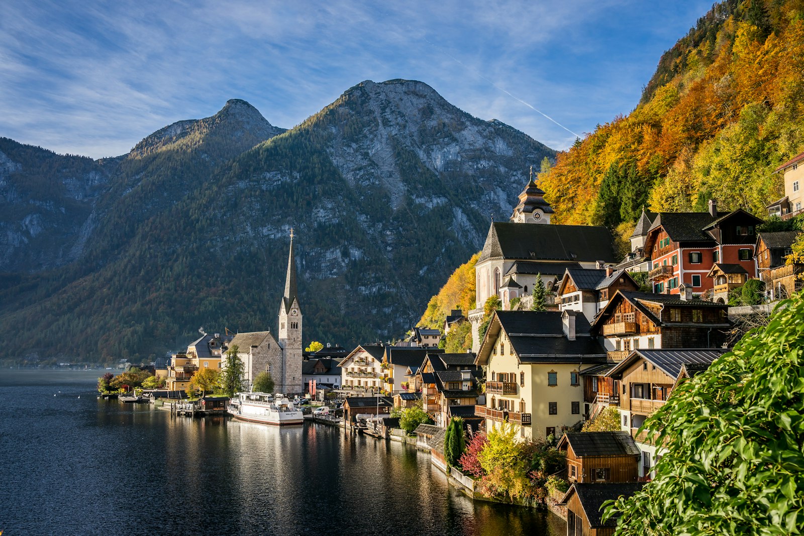 Hallstatt lakeside village with church and Dachstein mountains