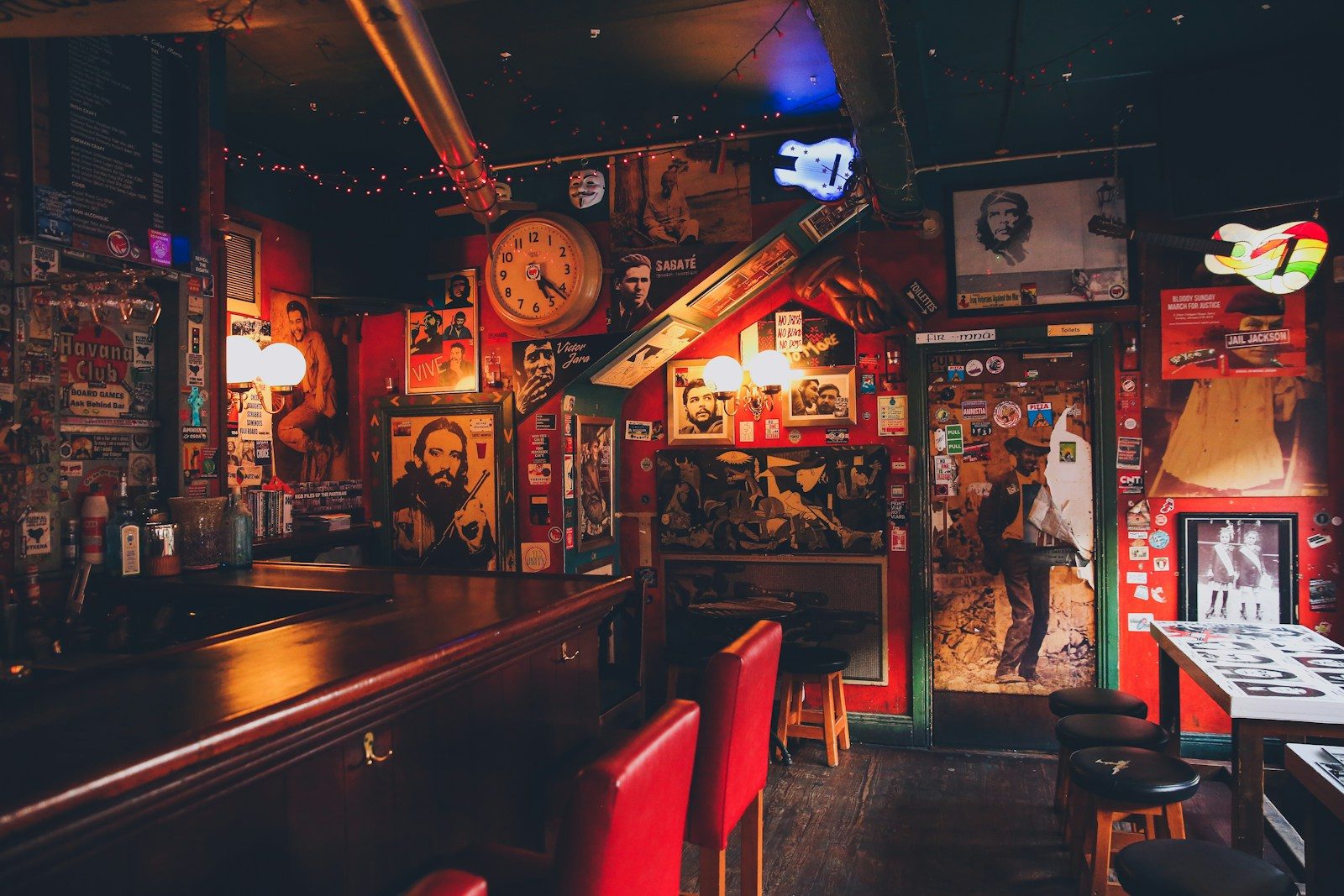 Wooden tables and chairs in a traditional pub interior