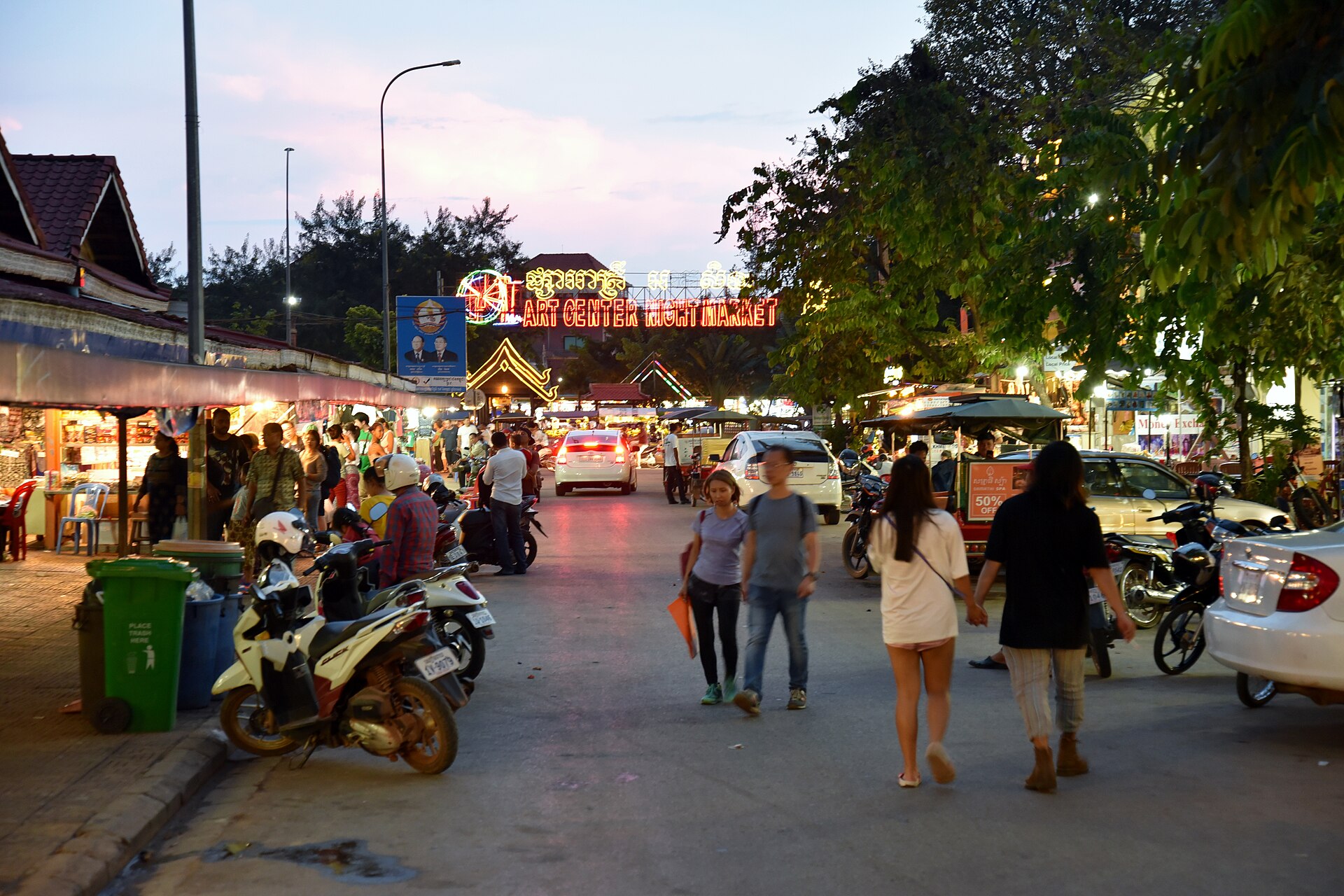 People walking through Siem Reap streets at night