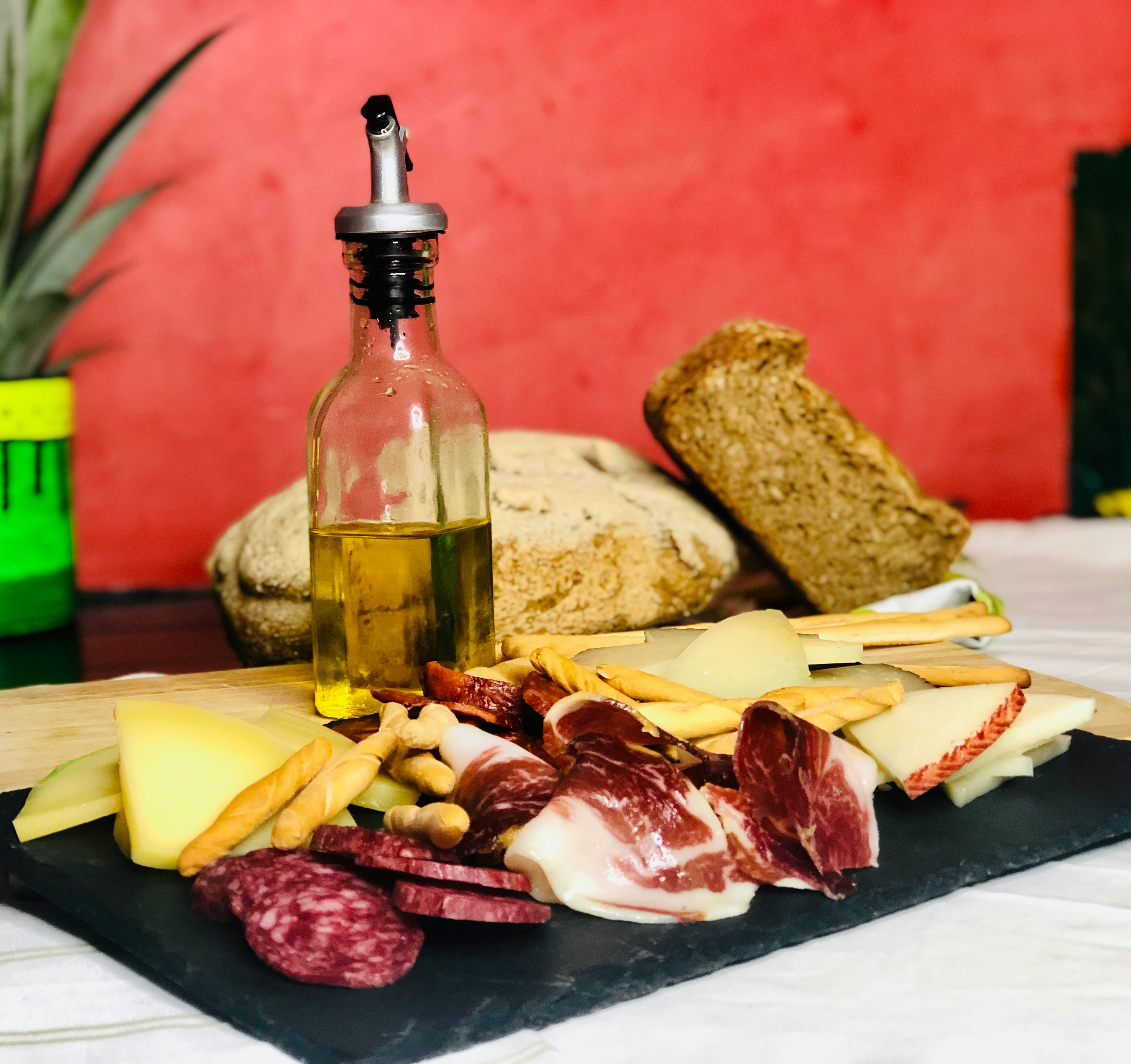 Tapas plates and drinks on a table in Madrid