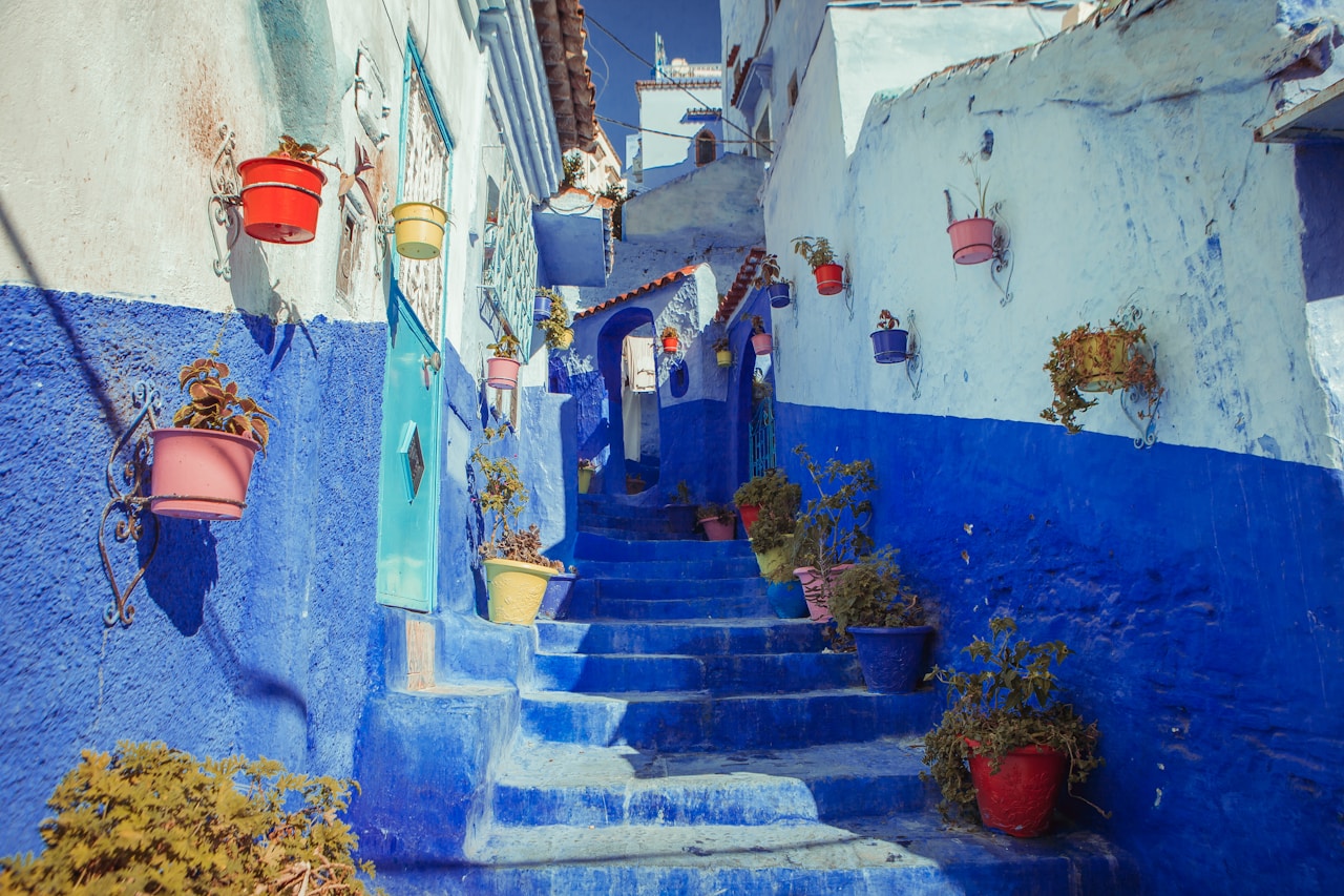 Blue-painted alley and stairs in Chefchaouen, Morocco