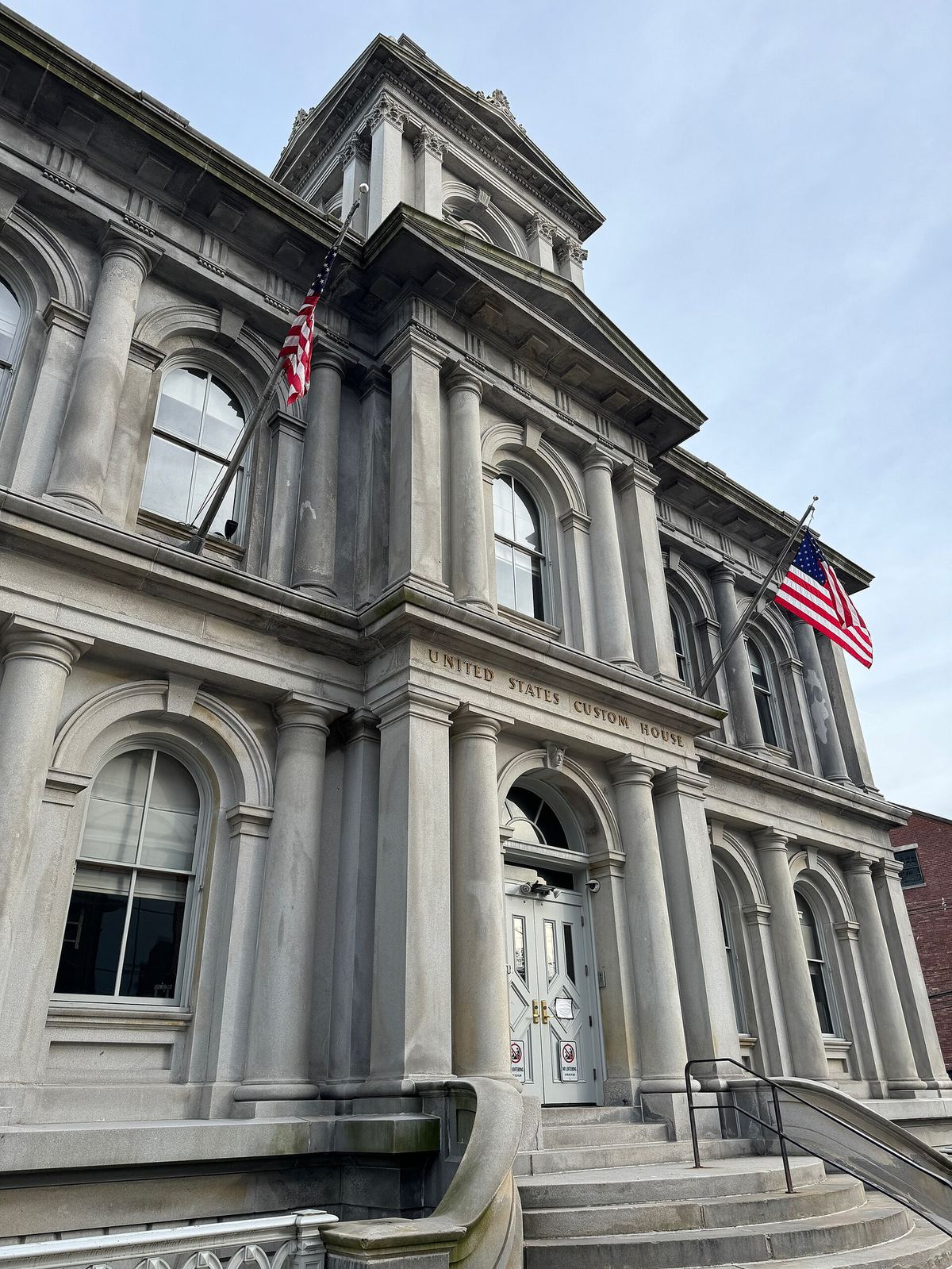 The historic United States Custom House in Portland, Maine, with its stone facade and classical columns