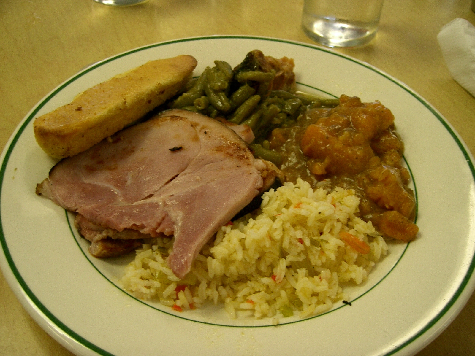 Cajun pork dish served with jambalaya rice