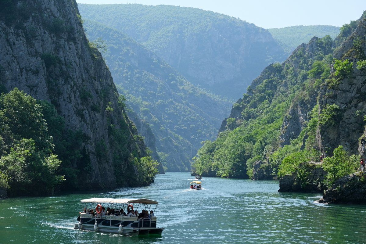 Steep rock walls and green water at Matka Canyon near Skopje, North Macedonia