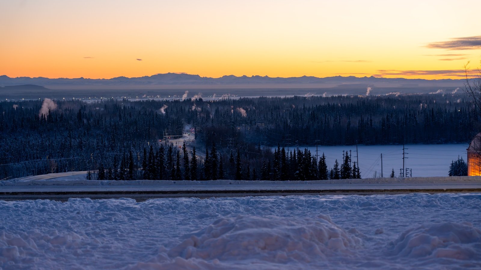 Winter sunset over snow-covered forests near Fairbanks, Alaska