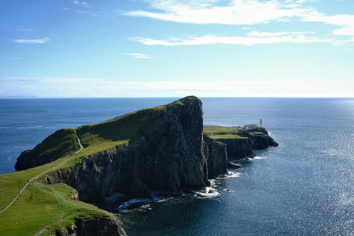 Neist Point lighthouse and cliff-edge coast on the Isle of Skye