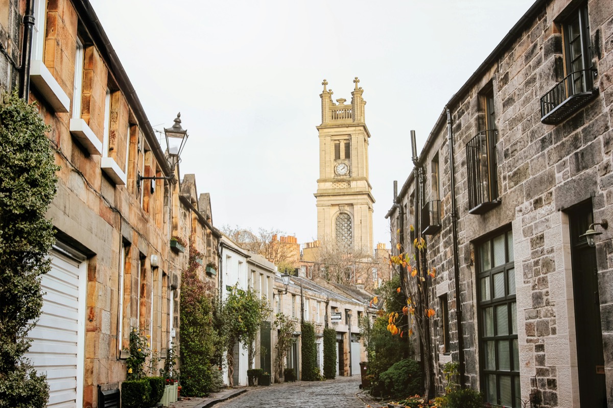 Circus Lane in Edinburgh's Stockbridge district with cobblestone street and historic stone townhouses