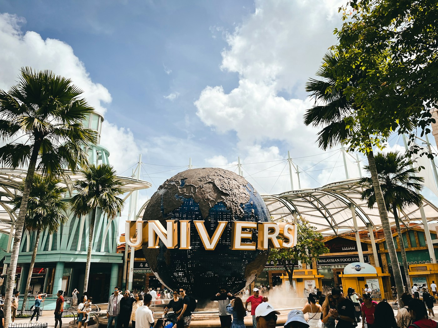 Visitors outside a themed building at Universal Studios Singapore