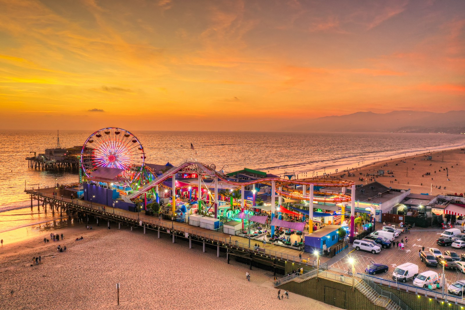 Santa Monica Pier amusement rides and beachfront along the Pacific