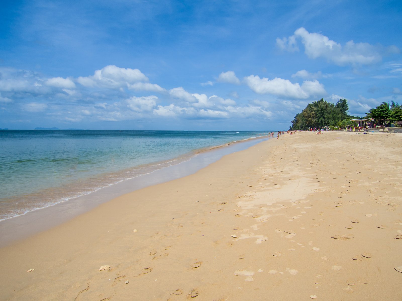 Quiet sandy beach and turquoise water on Koh Lanta, Thailand