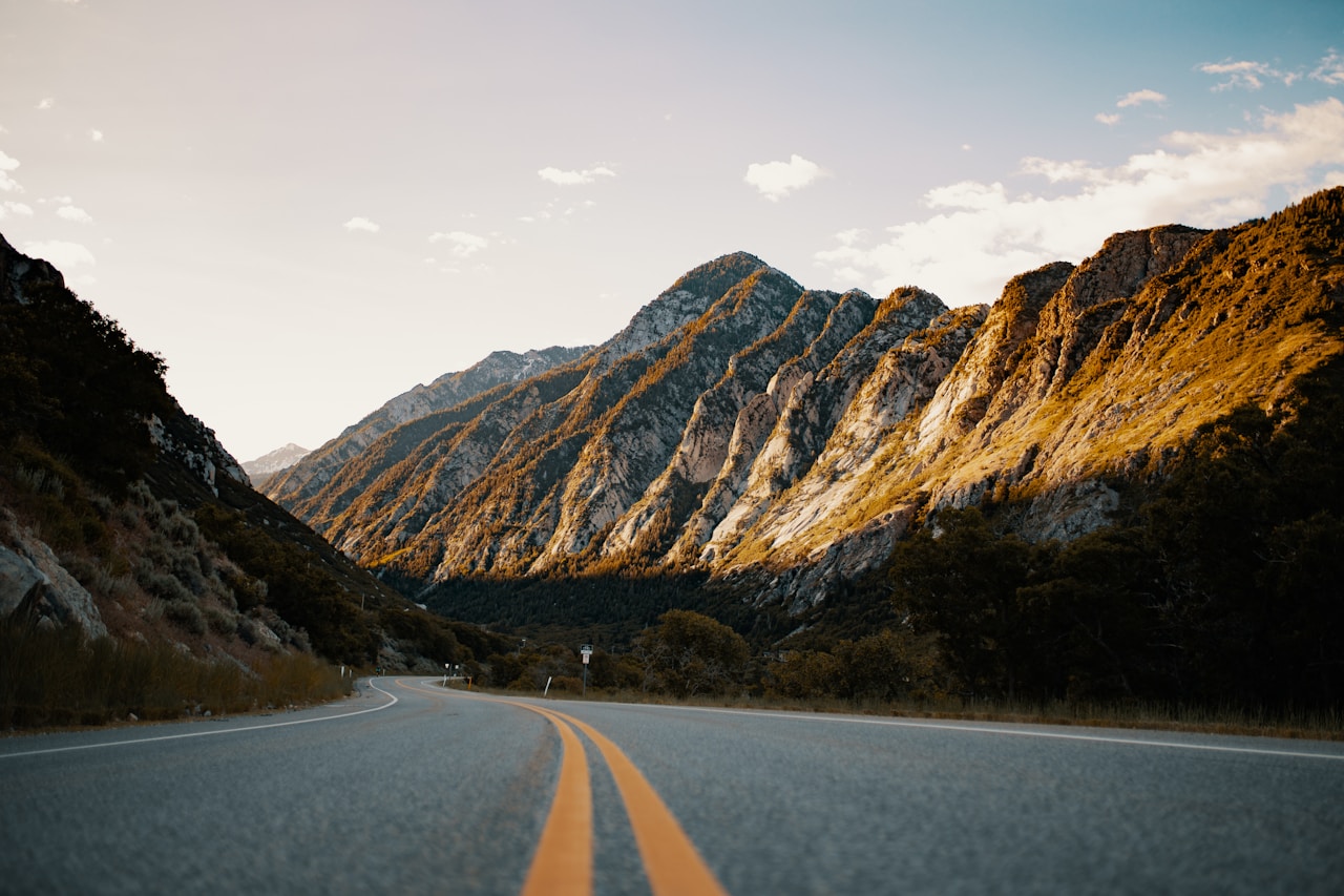 Scenic road transitioning from desert to mountains near Salt Lake City, Utah